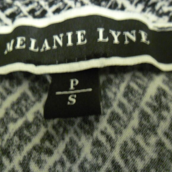 Two tops with ruched sides. Label says small but fits more like a medium. - Picture 3 of 6